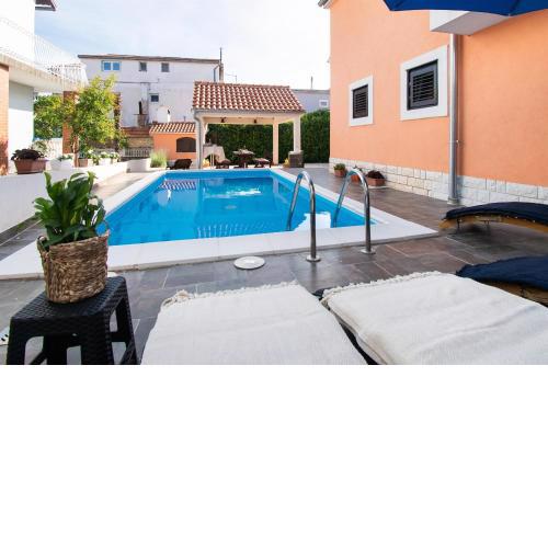 Apartments and Room Agiss with pool