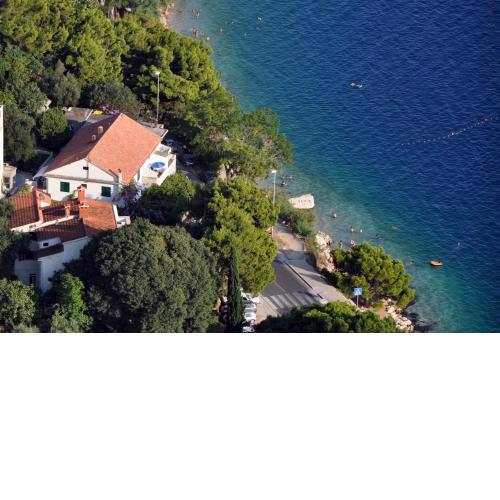 Apartments by the sea Omis - 6003