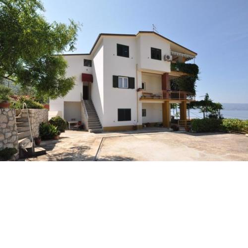 Apartments with a parking space Omis - 11066