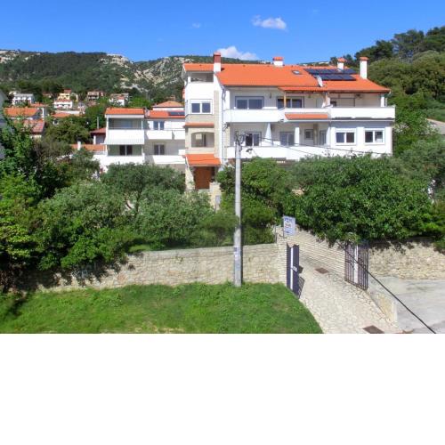 Apartments with a parking space Rab - 14792