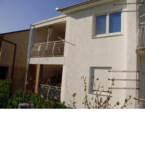 Apartments with a parking space Senj - 16008