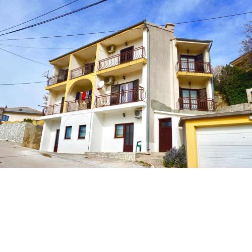 Apartments with a parking space Senj - 16747