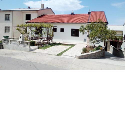 Apartments with a parking space Senj - 7475