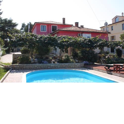 Apartments with a swimming pool Umag - 3358