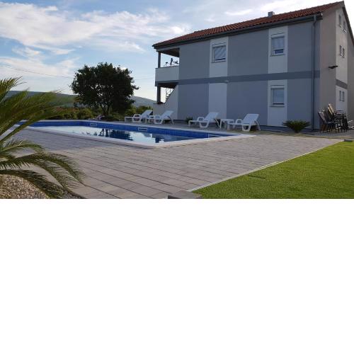 Apartments Zanic with private swimming pool and sea view