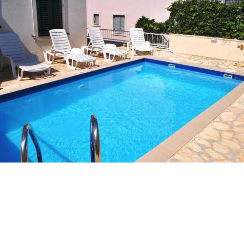 Appartamento Daisy con vista mare e piscina