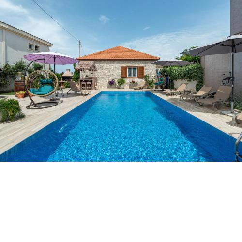 Beachfront Holiday home Delight with private pool