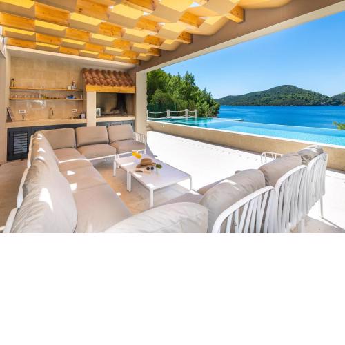 Beachfront Villa BrulupeS in secluded bay