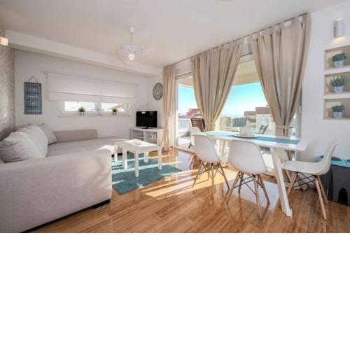 Blue sky, modern sea view apartment