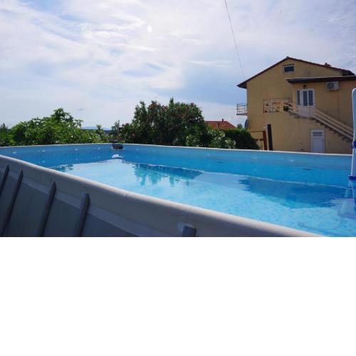 Family friendly apartments with a swimming pool Barbat, Rab - 4988
