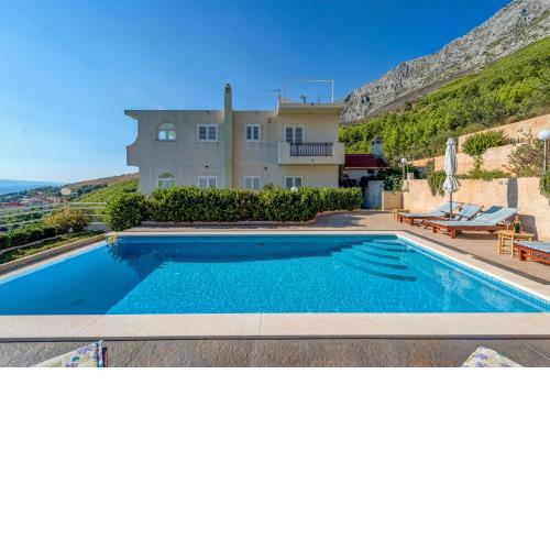 Family friendly apartments with a swimming pool Lokva Rogoznica, Omis - 11931