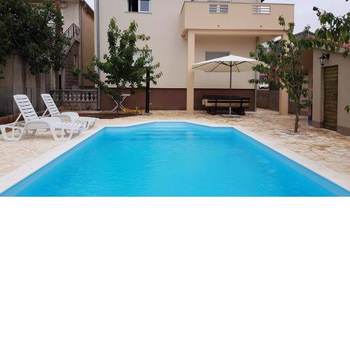 Family friendly apartments with a swimming pool Zadar - 14933
