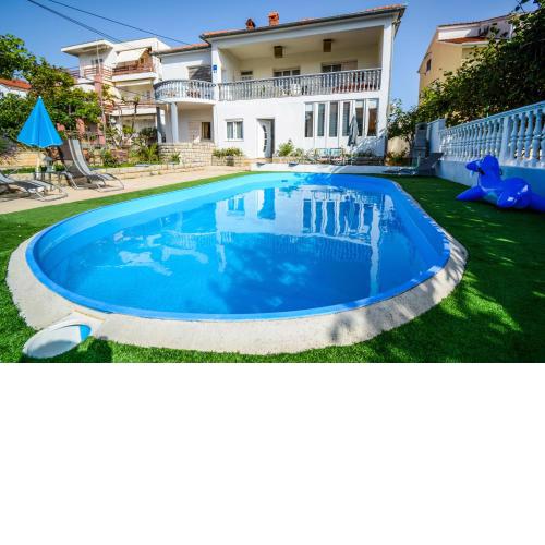 Family friendly apartments with a swimming pool Zadar - 17553