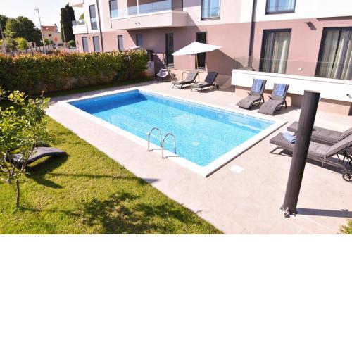 Luxury apartment Grotta with sea view and swimming pool