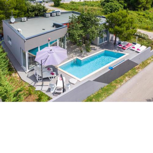Modern villa Jura with pool near the beach, extra pool heating available