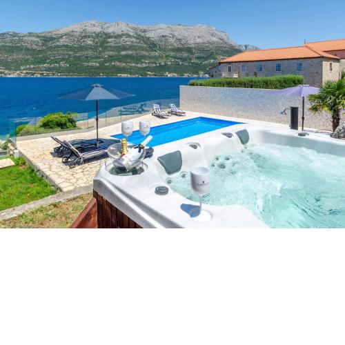 Seafront villa Gabriela on island Korčula, private pool, gym, private parking