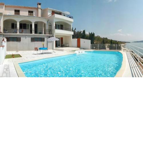 Seaside apartments with a swimming pool Seget Vranjica, Trogir - 2571