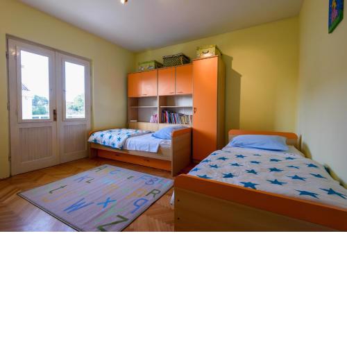 The apartments consists of two bedrooms, a bathroom, a kitchen and a living room